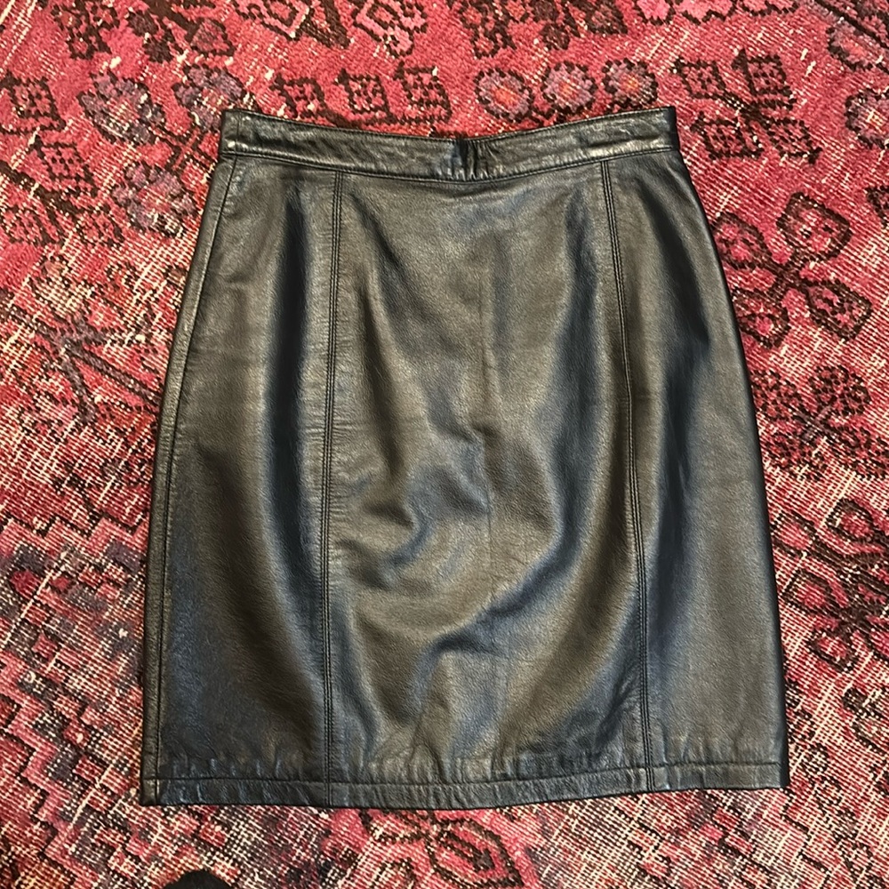 Black leather mini skirt